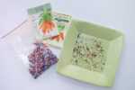 Mix tiny carrot seeds with candy sprinkles to make them easier to plant