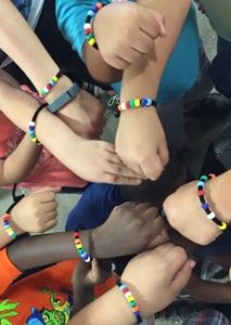 Eat a rainbow bracelets on many hands
