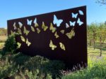 steel wall with butterfly silhouettes